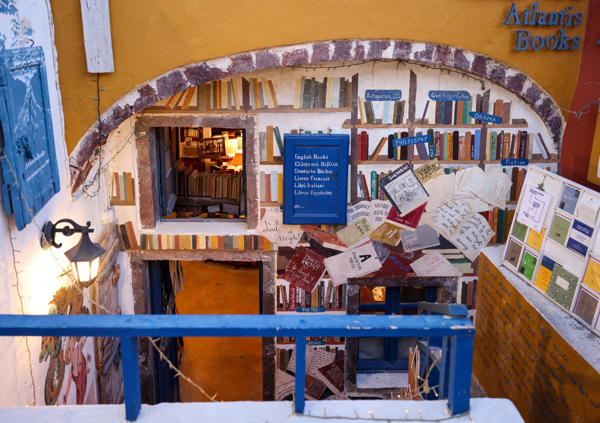 the exterior of atlantis bookstore in oia, santorini