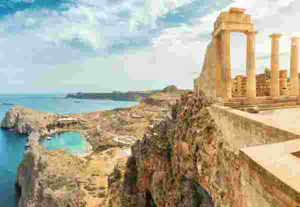 Famous tourist attraction - Acropolis of Lindos. Ancient architecture of Greece. Travel destinations of Rhodes island_Greek Winter Islands Lindos Rhodes_feature_Greek Winter Islands