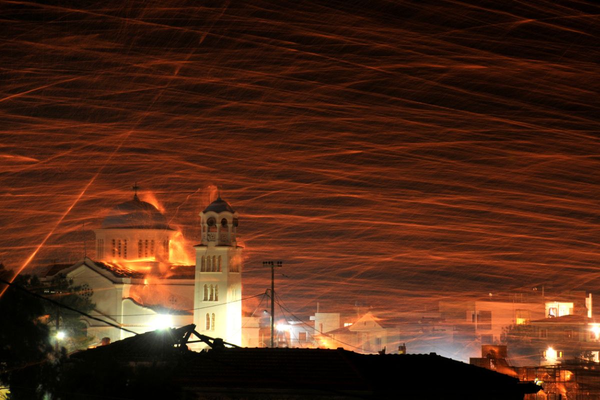 Rockets from orthodox church of Agios Markos are shooted towards church of Panagia Erythiani in a tradition that happens every easter.this is rocketwar in chios island