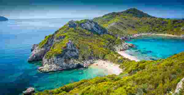 High angle view on beautiful Porto Timoni beach in Corfu. Located in the Ionian Sea of Greece the idyllic beach is surround by crystal clear turquoise water. Corfu beach_feature