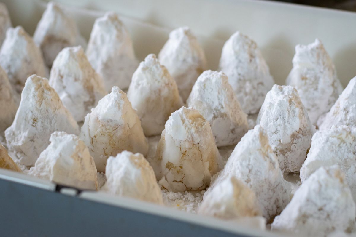 Amygdalota, traditional Greek homemade powder sugared almond cookies, selective focus_sweets in Greece