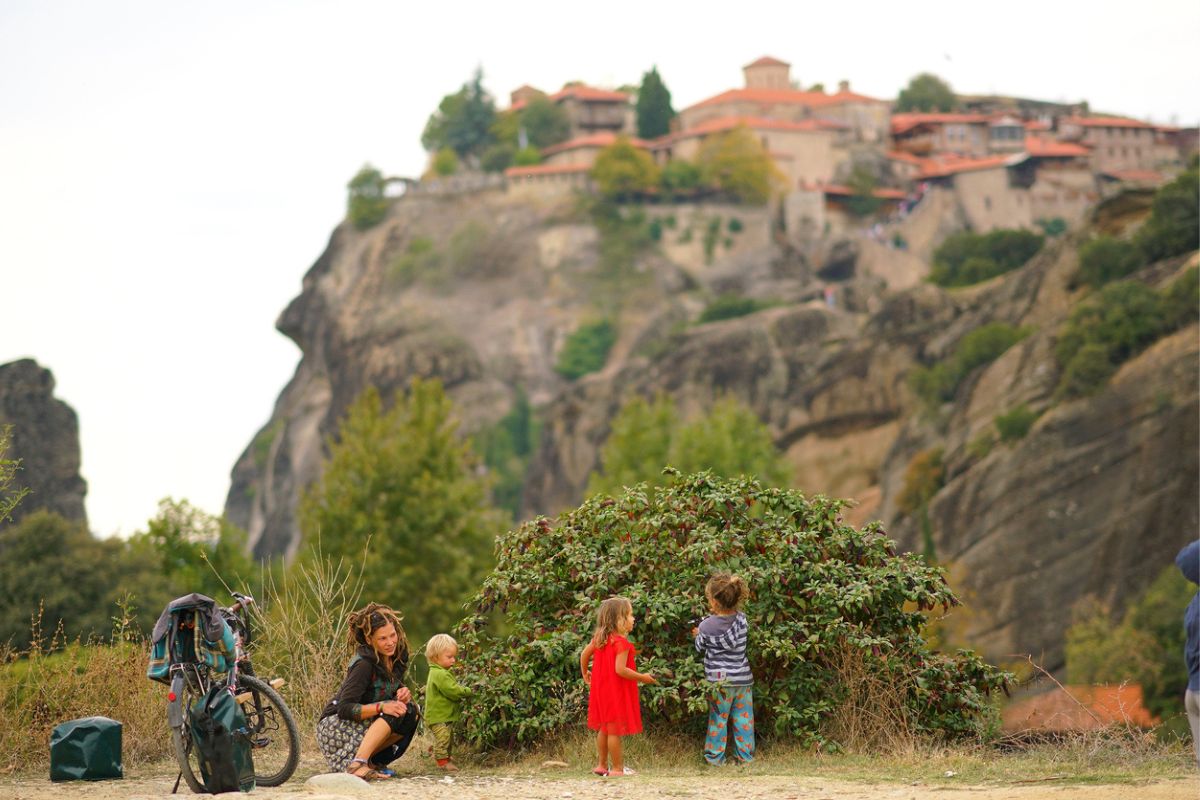 Meteora, Greece, October 12 2018, Children play happy and carefree in nature with the background of the monasteries