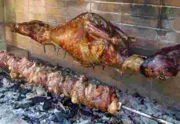 whole lamb on the spit and lamb on spit_greek easter_greek food_feature