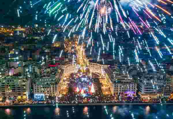 Aerial view of Aristotelous square in Thessaloniki in northern Greece during New Year 2020 celebrations with fantastic multi-colored fireworks thessaloniki new years_Greek New Year Customs_feature