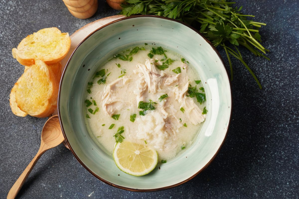 Avgolemono - traditional greek chicken soup with rice, lemon and eggs