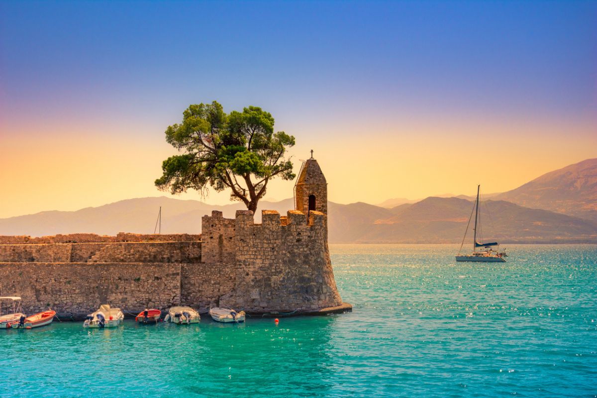 View of the port of Nafpaktos, Lepanto with the fortress and the entrance of the old Venetian harbor, Greece