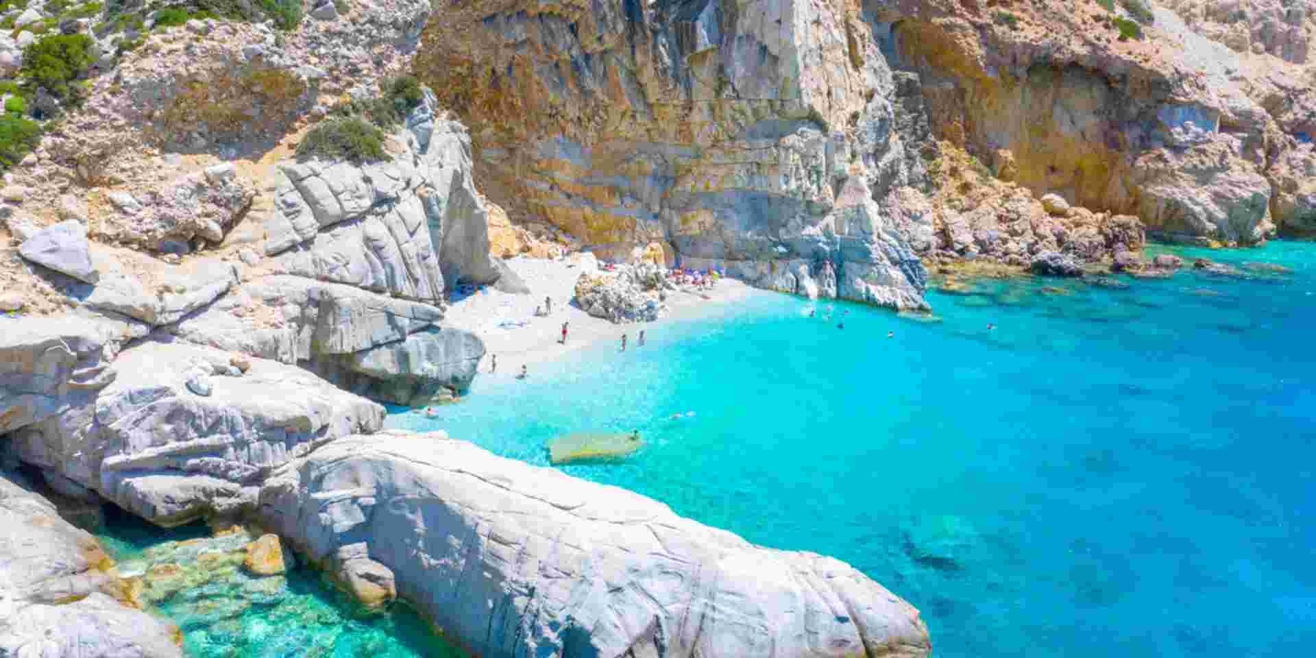 Beautiful sunny coast view to an amazing paradise holiday bay with crystal clear blue water sandy beach, Seychelles, Ikaria island, Greece. seychelles beach ikaria_feature
