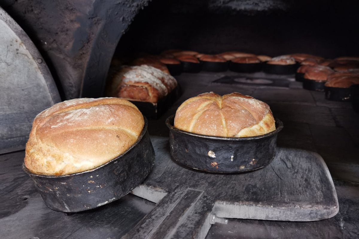 bread hot in traditional oven fresh just baked, in village vrosina greece