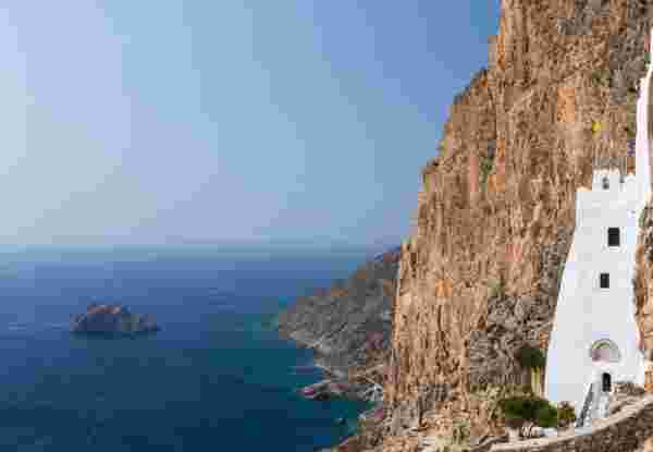 On the southern coast of the island of Amorgos in Greece, the monastery of Hozoviotissa stands on a rocky cliff and faces the deep blue of the Aegean sea. It is almost 1000 years old, the construction began in 1088 AD. monastery of Hozoviotissa_Amorgos_feature