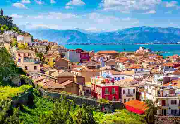 Nafplio or Nafplion, Greece, Peloponnese old town houses aerial panorama and snow mountains banner Nafplio_peloponnese_feature