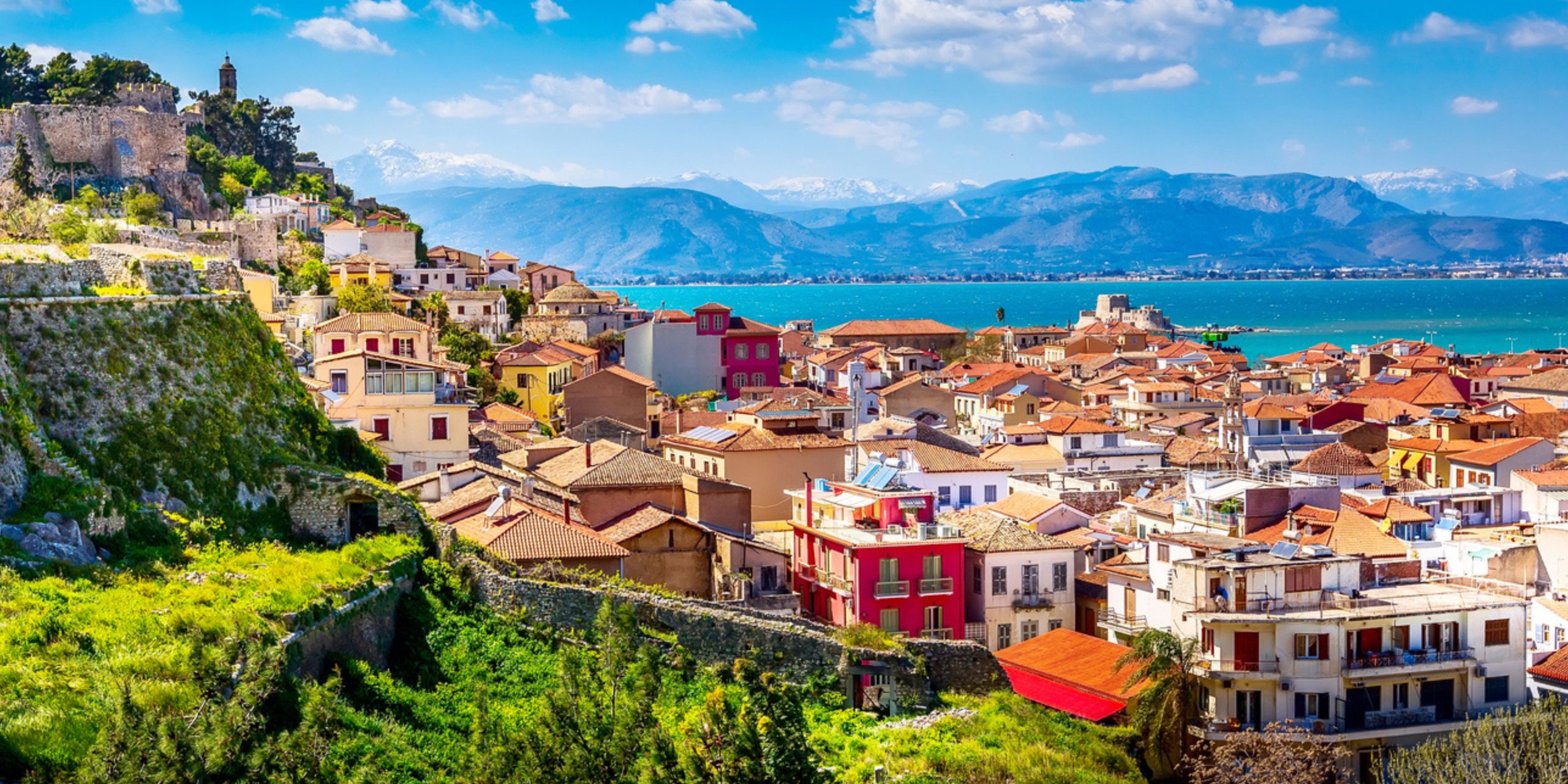 Nafplio or Nafplion, Greece, Peloponnese old town houses aerial panorama and snow mountains banner_August 15th