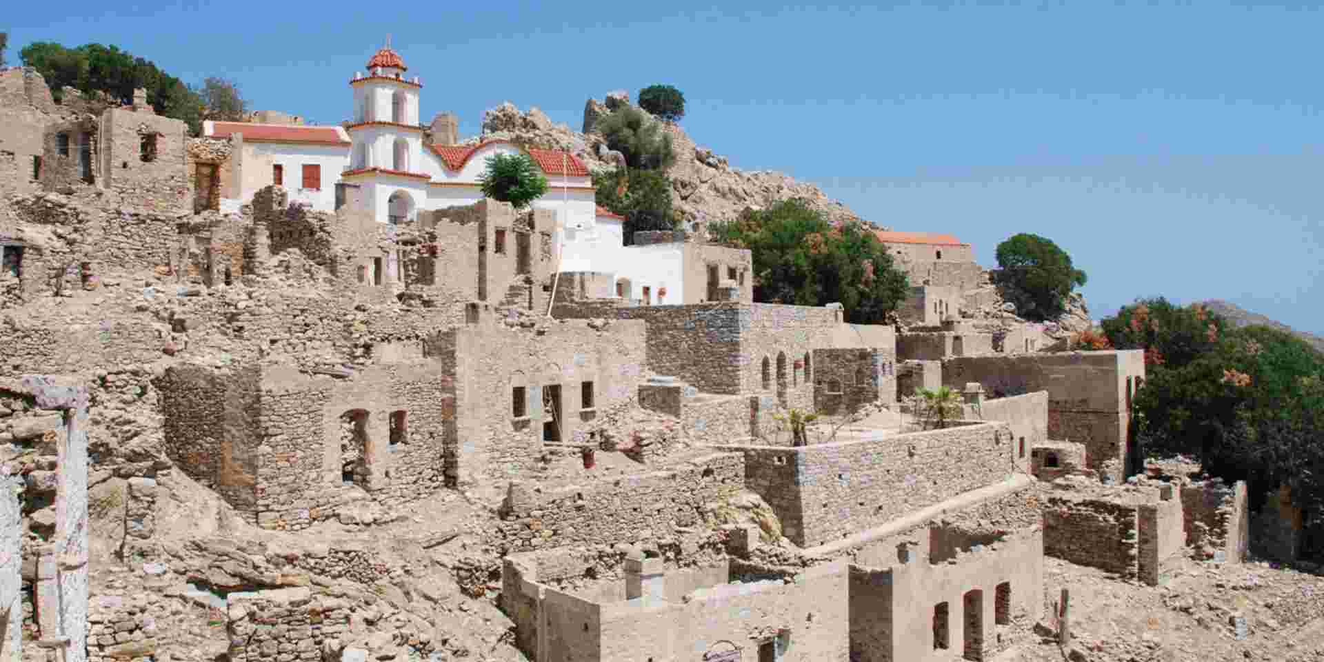 The ruins of the abandoned village of Mikro Chorio on the Greek island of Tilos. Tilos Island_feature