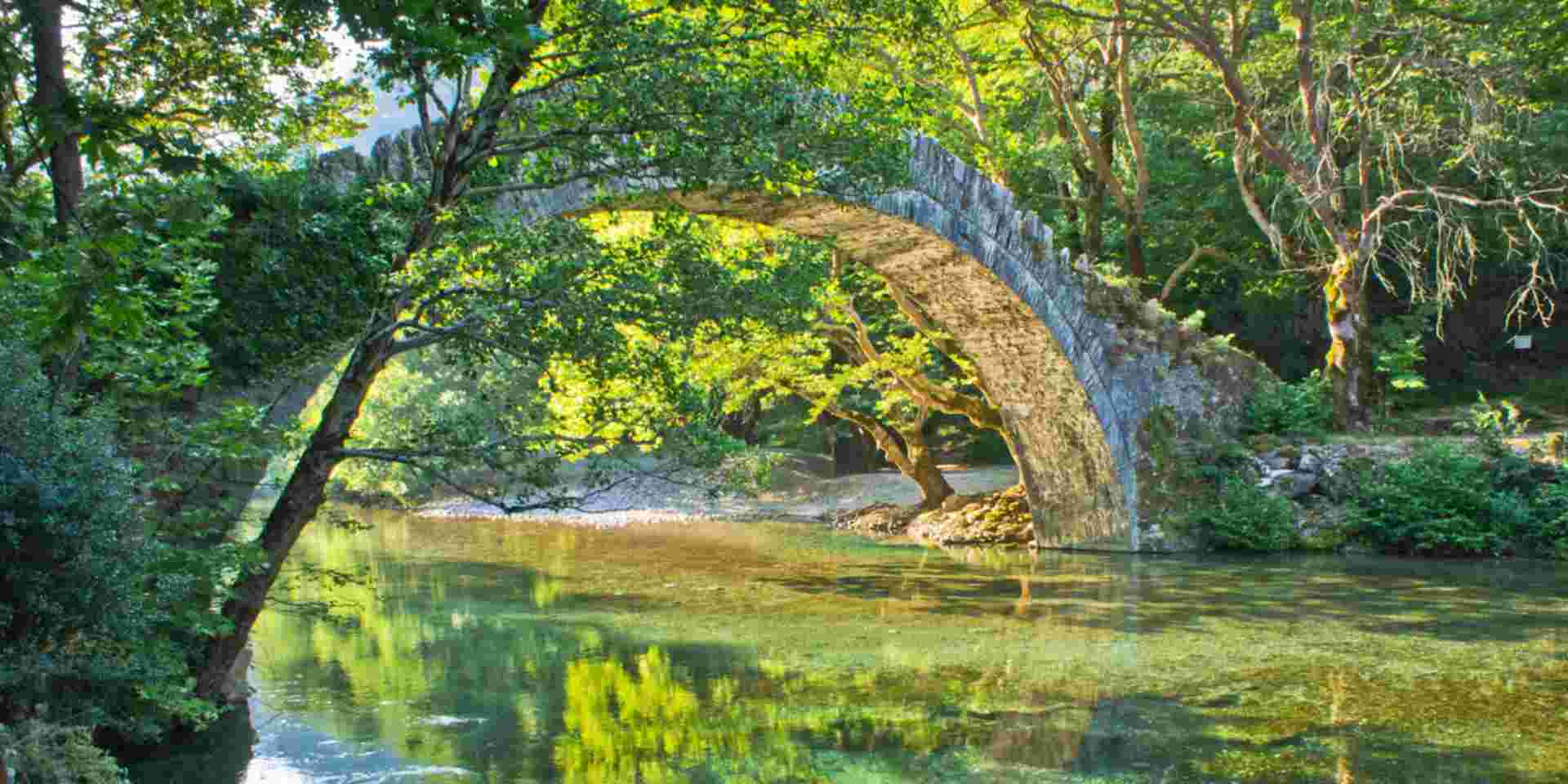 Old stone bridge, Aoos river, Epirus, Greece, Europe Aoos River_zagori_feature