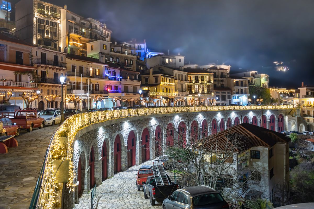 The village of Arachova, Greece, next to the mountain Paranssus during a cold winter night with Christmas decoration lights