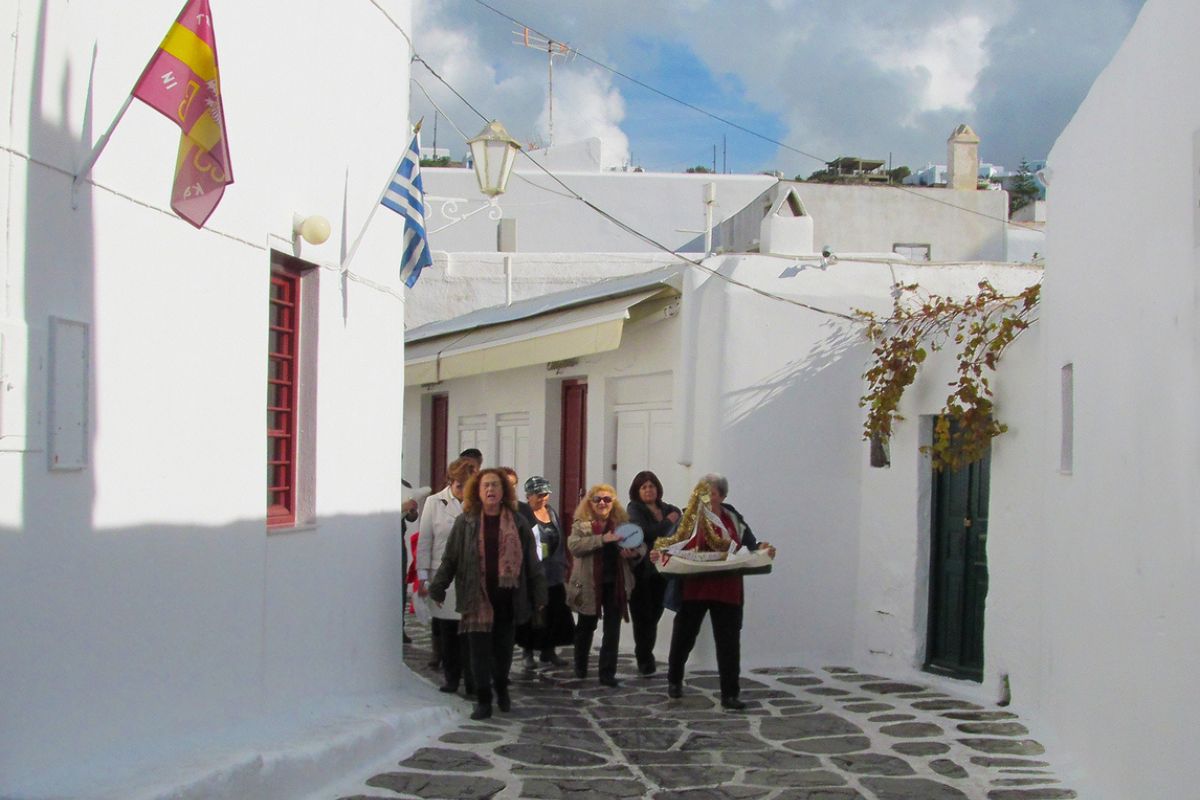 Mykonos, Greece - 31st December 2012: Unidentified people singing traditional New Year carols in the streets of Mykonos Town