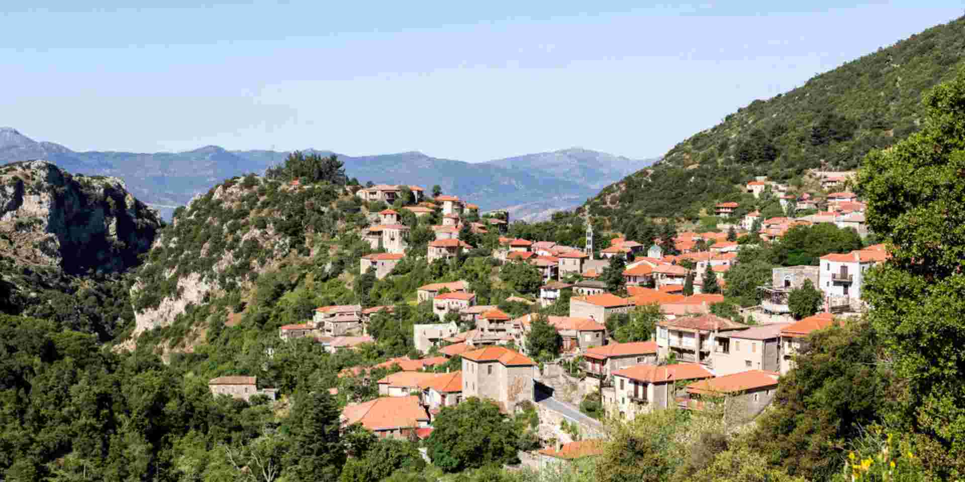 Landscape. View of the village Stemnitsa in the mountains on a summer, sunny day (district Arcadia, Peloponnese, Greece). Stemnitsa_arcadia_traditional villages greece_feature