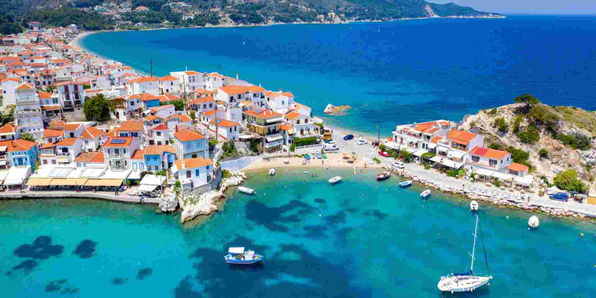 View of Kokkari fishing village with beautiful beach, Samos island, Greece samos_best time to visit Greece