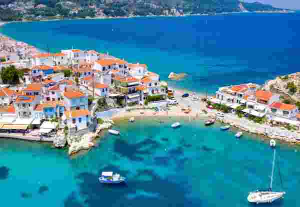 View of Kokkari fishing village with beautiful beach, Samos island, Greece samos_best time to visit Greece