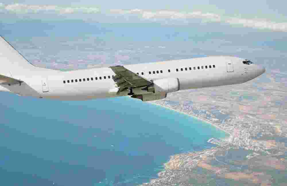 Flights-over-Greece_cost-of-honeymoon-in-Greece-scaled