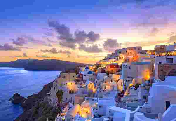 Santorini sunset at dawn village of Oia Greece