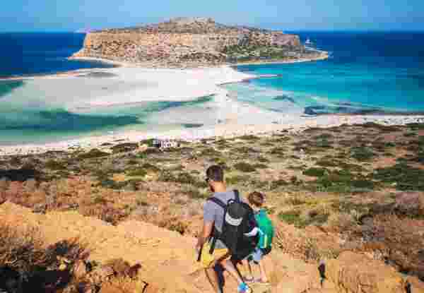 Father and son having beach vacation Balos_crete with kids