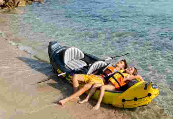Active teenagers having fun with inflatable raft on their summer vacation Best Greek Island for teenage families_feature