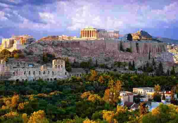 View of Parthenon Temple and Odeon of Herodes Atticus on Acropolis Hill at sunset, Athens, Greece athens in fall_weather in greece in november_feature