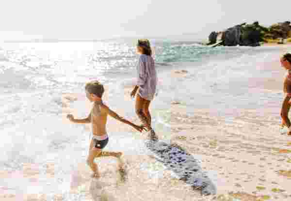 Photo of mother and her kids, enjoying together at the beach best greek islands for families_feature
