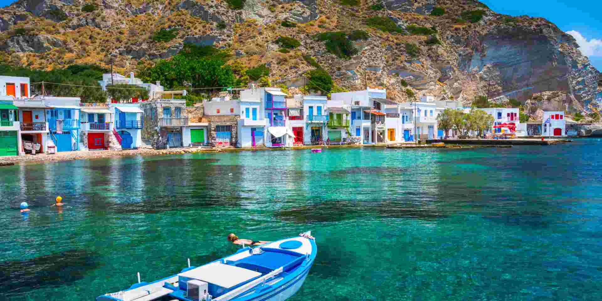 Scenic Klima village (traditional Greek village by the sea, the Cycladic-style) with sirmata - traditional fishermen's houses, Milos island, Cyclades, Greece. klima village milos_best greek islands in may_feature