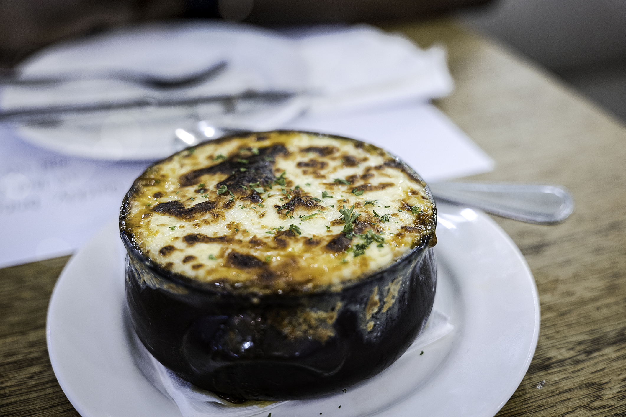 Moussaka is a very typical Greek dish. It is an eggplant- or potato-based dish and very similar to Shepherd's pie. What we had at a Greek restaurant was eggplant-based.
