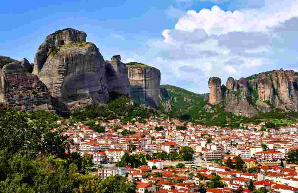 Kalampaka and Kastraki villages at foot of Meteora cliffs and pillars on sunny spring day. Greece, UNESCO World Heritage