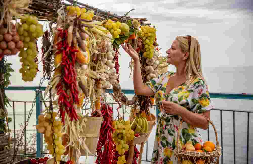Young Woman Choosing Fresh Fruits