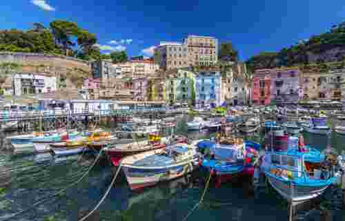 Small fishing boats at harbor Marina Grande in Sorrento, Campania, Amalfi Coast, Italy.