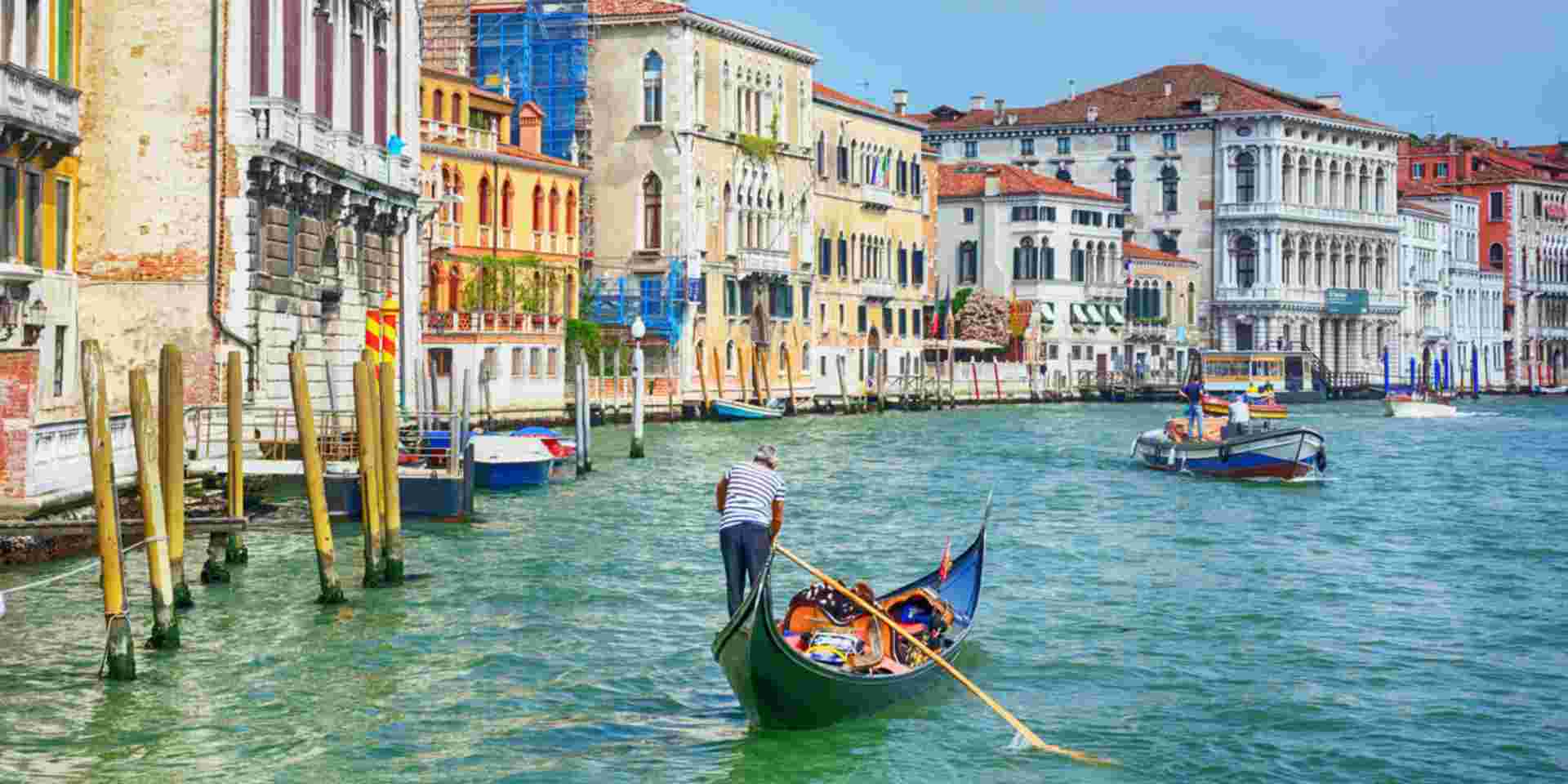 Canale Grande forms one of the major water-traffic corridors in the city. Public transport is provided by water buses and private water taxis, and many tourists explore the canal by gondola. venice_feature