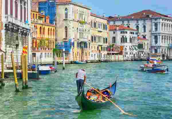Canale Grande forms one of the major water-traffic corridors in the city. Public transport is provided by water buses and private water taxis, and many tourists explore the canal by gondola. venice_feature