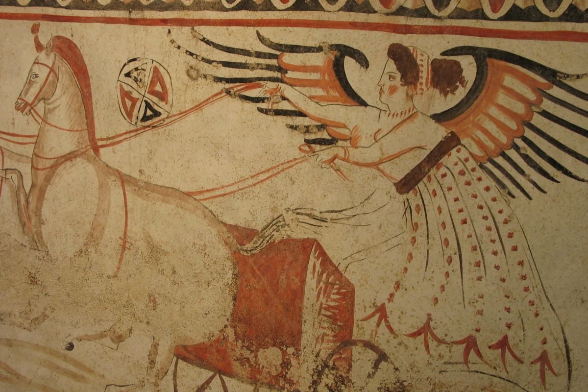 Ancient fresco from Pompeii depicting a winged figure driving a chariot, showcasing Roman art and mythology.