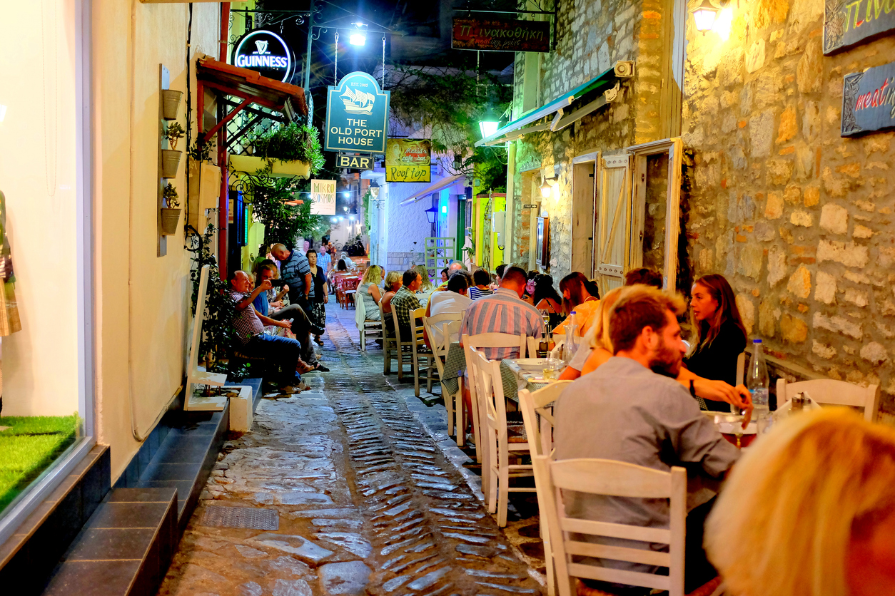 Skiathos, Greece. September 13, 2017. Night life on the back streets of Skiathos town with pubs and restaurant on the Island of Skiathos in Greece.
