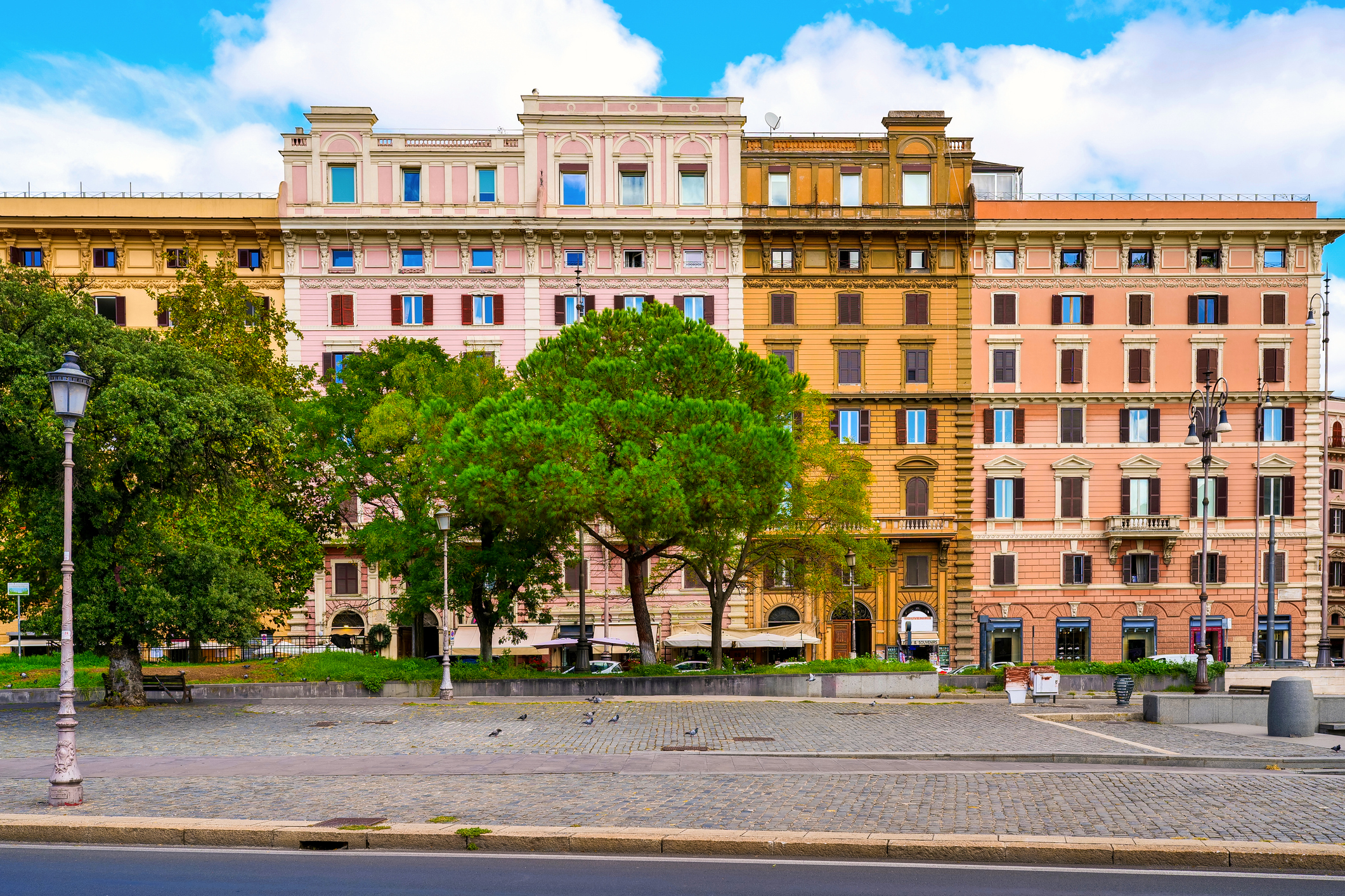 A cityscape of the lovely Piazza Risorgimento in the Prati district, located in the historic center of Rome, near the Vatican City and St. Peter's Basilica. Prati is a historic and elegant district built at the end of the 19th century after the unification of Italy and the definition of Rome as the capital of the new nation, to host the growing city population and the upper middle class. In 1980 the historic center of Rome was declared a World Heritage Site by Unesco. Image in high definition format.