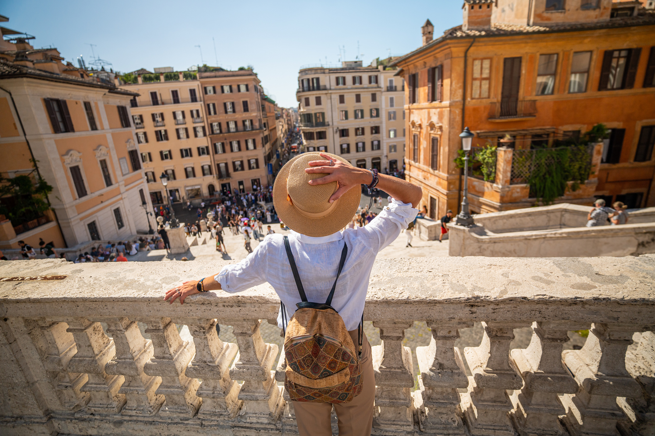 Woman standing in the Spanish Steps in Rome, Italy viewed from above Trinità dei Monti
