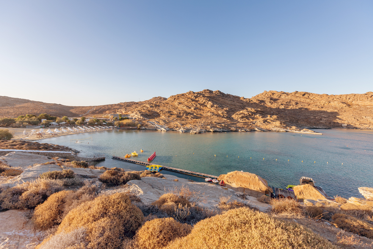 "Kolimpithres Bay with beautiful sand beach on Paros Island during sunset. Paros, Greece."