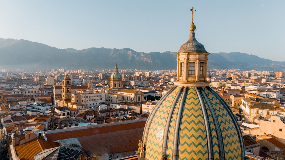 Palermo skyline featuring the distinctive dome of the Cathedral and surrounding historic architecture